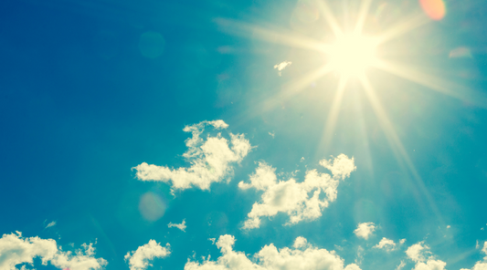 Sunny summer sky with a few clouds