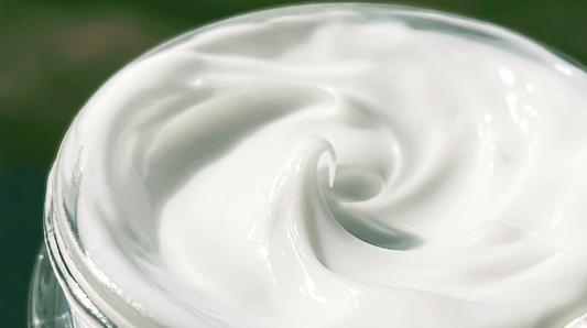 An open moisturiser jar