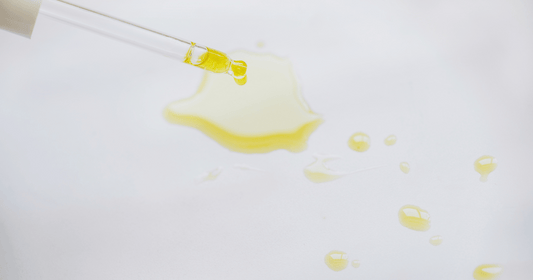 Oil serum texture close-up picture.