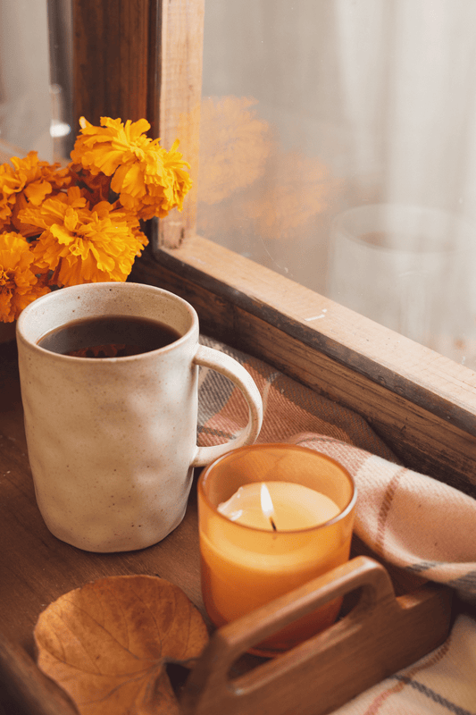Autumnal window sill set up for transitioning your skincare