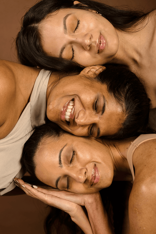 Faces of three women