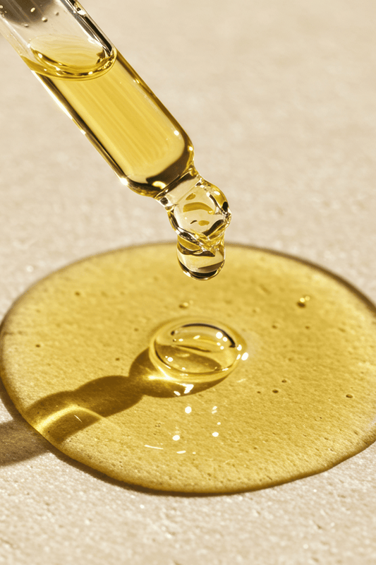 Glow oil serum droplet