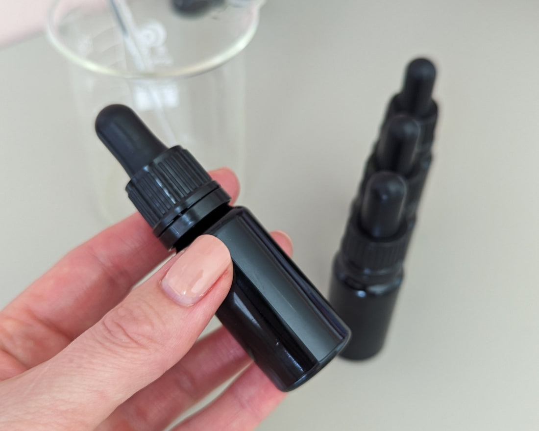 Black small skincare dropper bottle